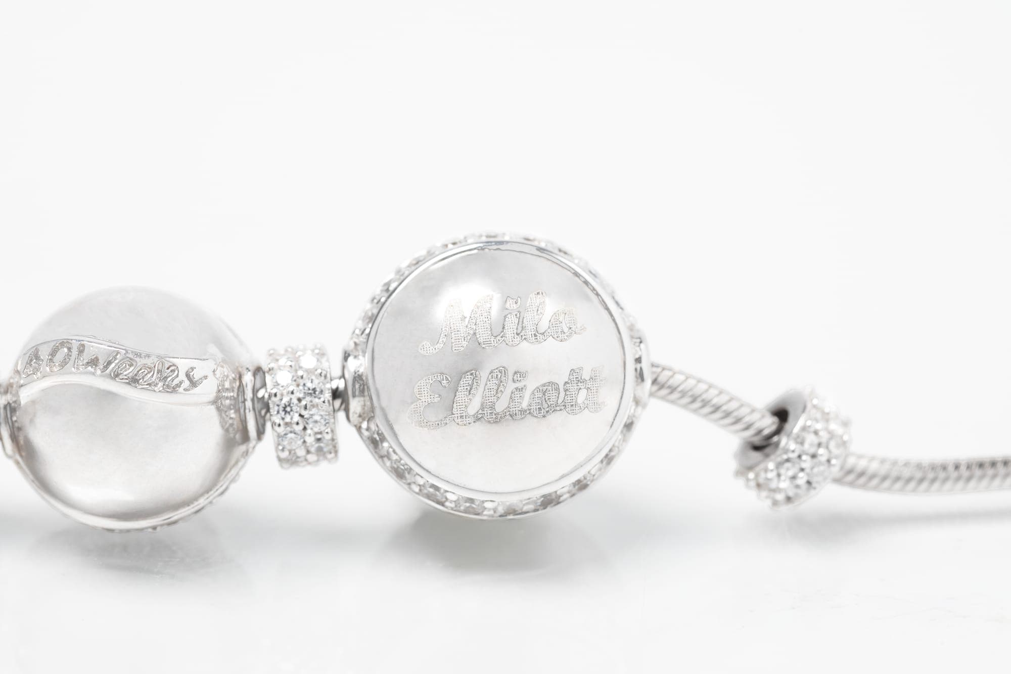 Custom arrival charm engraved with baby name